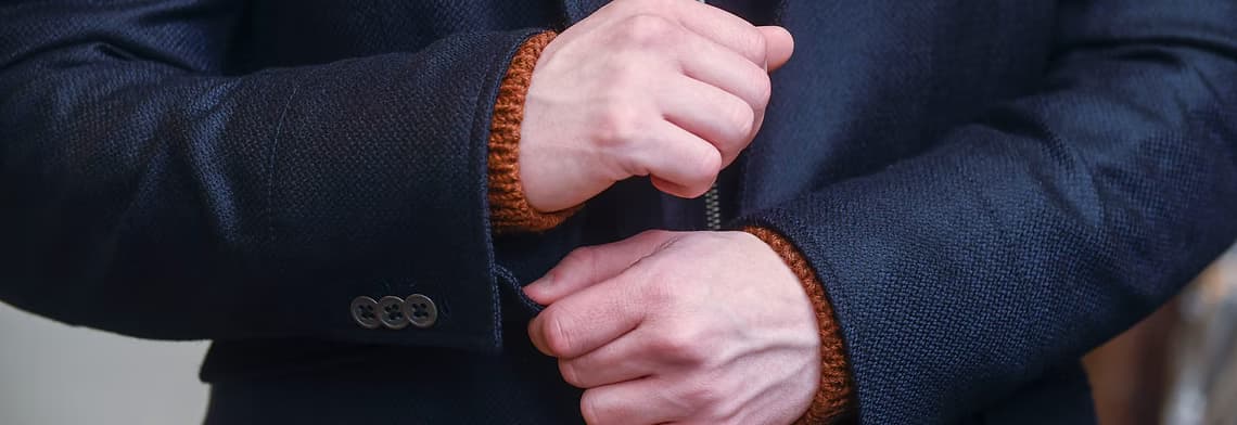 Elegant dark suit showcasing DAVIDSONS tailoring
